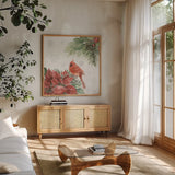 Feathered Festivities III by Leslie Trimbach. Shown in a natural wood frame in a cozy modern living room. Available as an archival giclee rolled canvas, fine art paper, or poster print. SKU 89076a.