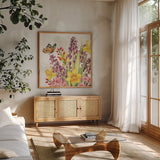 Fresh Petals VI by Leslie Trimbach. Shown in a natural wood frame in a cozy modern living room. Available as an archival giclee rolled canvas, fine art paper, or poster print. SKU 102808a.