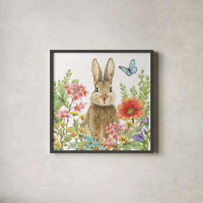 Garden Bunnies III by Leslie Trimbach. Shown in a sleek black glass frame for a contemporary gallery look. Available as an archival giclee rolled canvas, fine art paper, or poster print. SKU 83603a.
