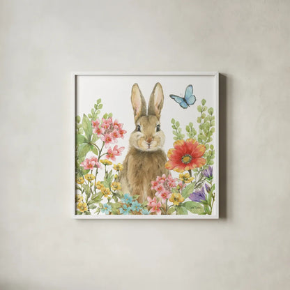 Garden Bunnies III by Leslie Trimbach. Shown in a crisp white glass frame for a clean and minimalist style. Available as an archival giclee rolled canvas, fine art paper, or poster print. SKU 83603a.