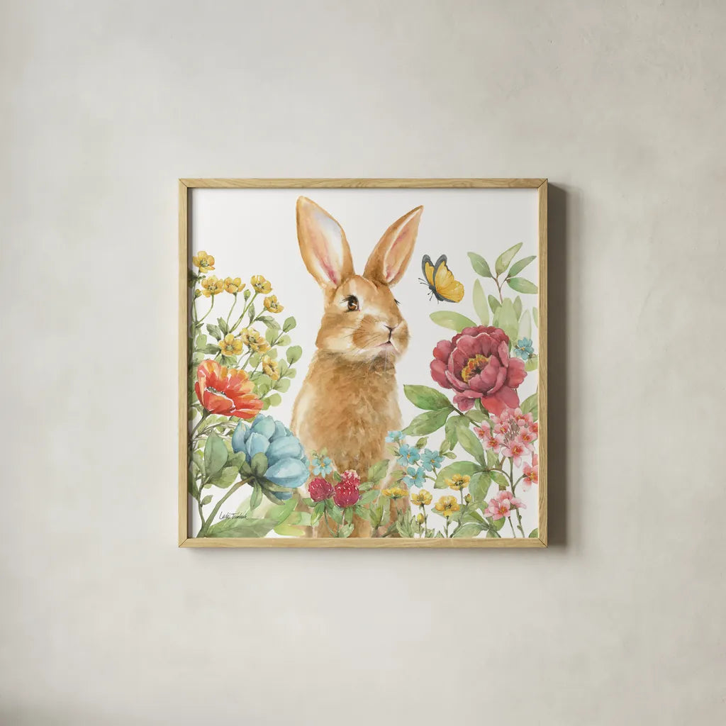 Garden Bunnies IV by Leslie Trimbach. Shown in a natural wood glass frame for a timeless modern aesthetic. Available as an archival giclee rolled canvas, fine art paper, or poster print. SKU 83604a.