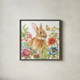 Garden Bunnies V by Leslie Trimbach. Shown in a sleek black glass frame for a contemporary gallery look. Available as an archival giclee rolled canvas, fine art paper, or poster print. SKU 83605a.