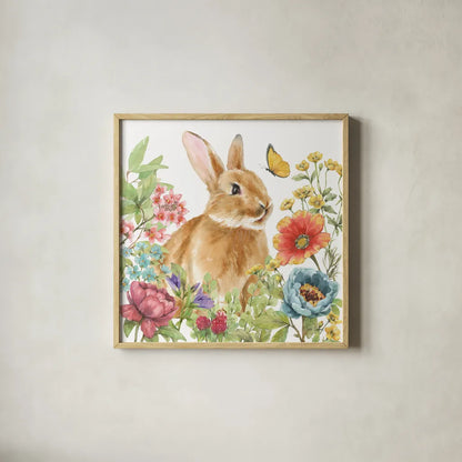 Garden Bunnies V by Leslie Trimbach. Shown in a natural wood glass frame for a timeless modern aesthetic. Available as an archival giclee rolled canvas, fine art paper, or poster print. SKU 83605a.