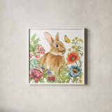 Garden Bunnies V by Leslie Trimbach. Shown in a crisp white glass frame for a clean and minimalist style. Available as an archival giclee rolled canvas, fine art paper, or poster print. SKU 83605a.