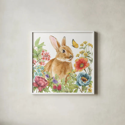 Garden Bunnies V by Leslie Trimbach. Shown in a crisp white glass frame for a clean and minimalist style. Available as an archival giclee rolled canvas, fine art paper, or poster print. SKU 83605a.
