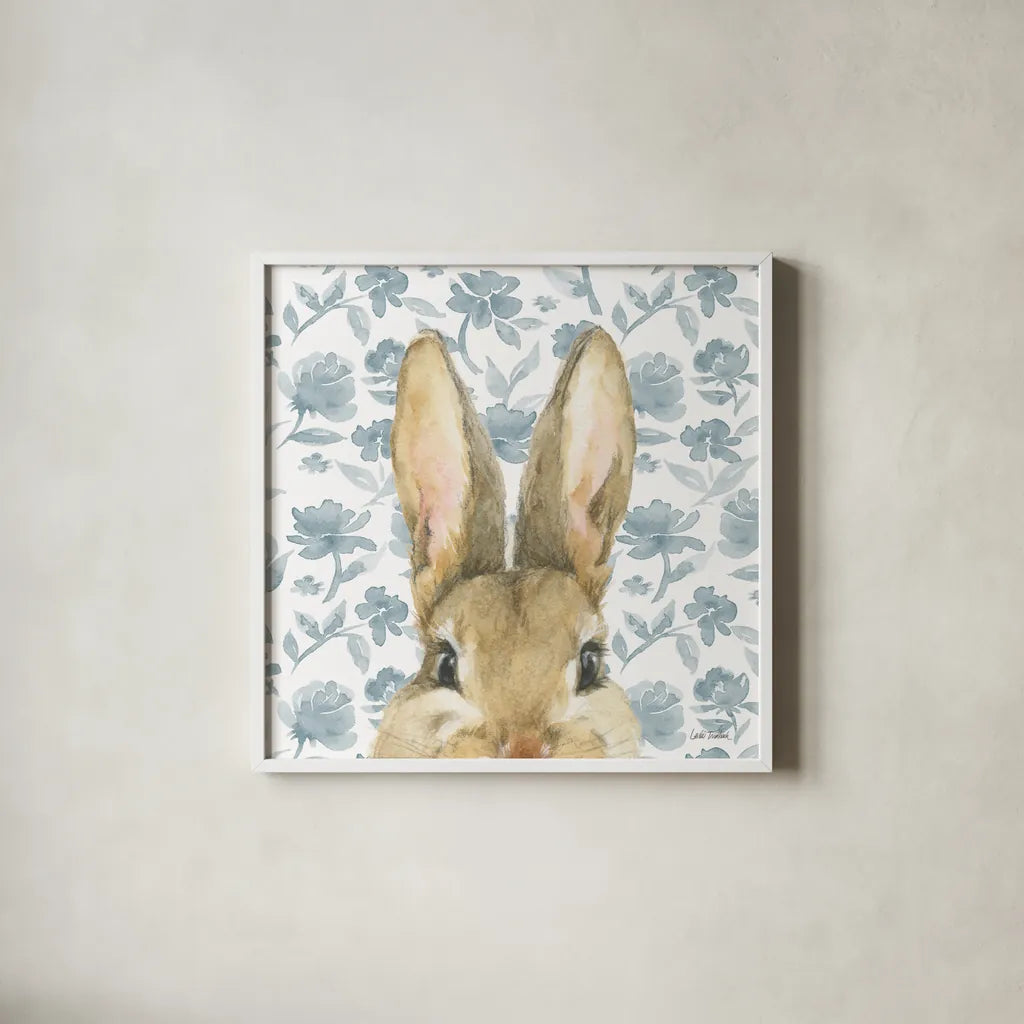 Garden Bunnies VI by Leslie Trimbach. Shown in a crisp white glass frame for a clean and minimalist style. Available as an archival giclee rolled canvas, fine art paper, or poster print. SKU 83606a.