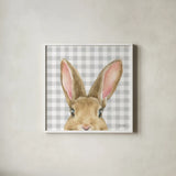 Garden Bunnies VII by Leslie Trimbach. Shown in a crisp white glass frame for a clean and minimalist style. Available as an archival giclee rolled canvas, fine art paper, or poster print. SKU 83607a.
