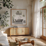 Serene Bath II Gray by Leslie Trimbach. Shown in a natural wood frame in a cozy modern living room. Available as an archival giclee rolled canvas, fine art paper, or poster print. SKU 84746a.