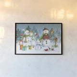 Snowman Family I by Leslie Trimbach. shown as a paper print in a black flame. Available as a archival giclee rolled canvas, fine art paper, or poster print. SKU 85253i.