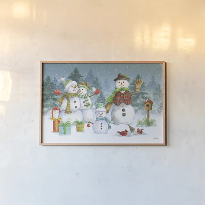 Snowman Family I by Leslie Trimbach. shown as a paper print in a natural frame. Available as a archival giclee rolled canvas, fine art paper, or poster print. SKU 85253i.