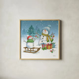 Snowman Family III by Leslie Trimbach. Shown in a natural wood glass frame for a timeless modern aesthetic. Available as an archival giclee rolled canvas, fine art paper, or poster print. SKU 85255a.