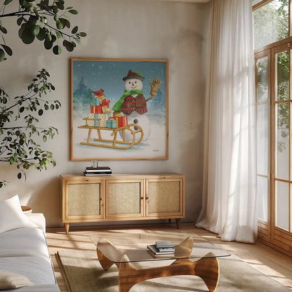 Snowman Family IV by Leslie Trimbach. Shown in a natural wood frame in a cozy modern living room. Available as an archival giclee rolled canvas, fine art paper, or poster print. SKU 85256a.
