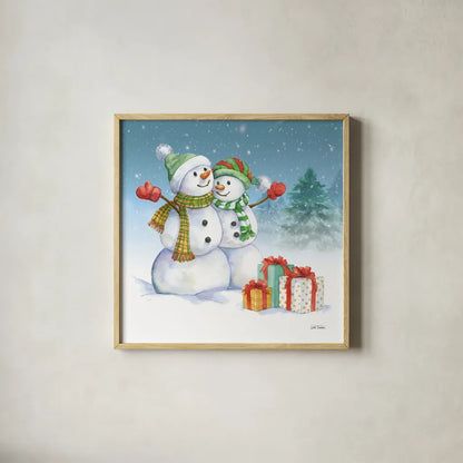 Snowman Family V by Leslie Trimbach. Shown in a natural wood glass frame for a timeless modern aesthetic. Available as an archival giclee rolled canvas, fine art paper, or poster print. SKU 85257a.