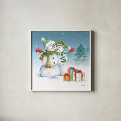 Snowman Family V by Leslie Trimbach. Shown in a crisp white glass frame for a clean and minimalist style. Available as an archival giclee rolled canvas, fine art paper, or poster print. SKU 85257a.
