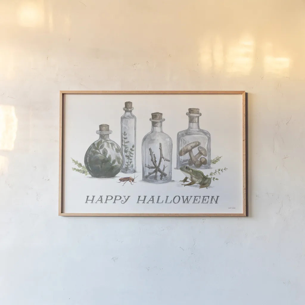 Spooky Halloween I Color by Leslie Trimbach. shown as a paper print in a natural frame. Available as a archival giclee rolled canvas, fine art paper, or poster print. SKU 93067i.