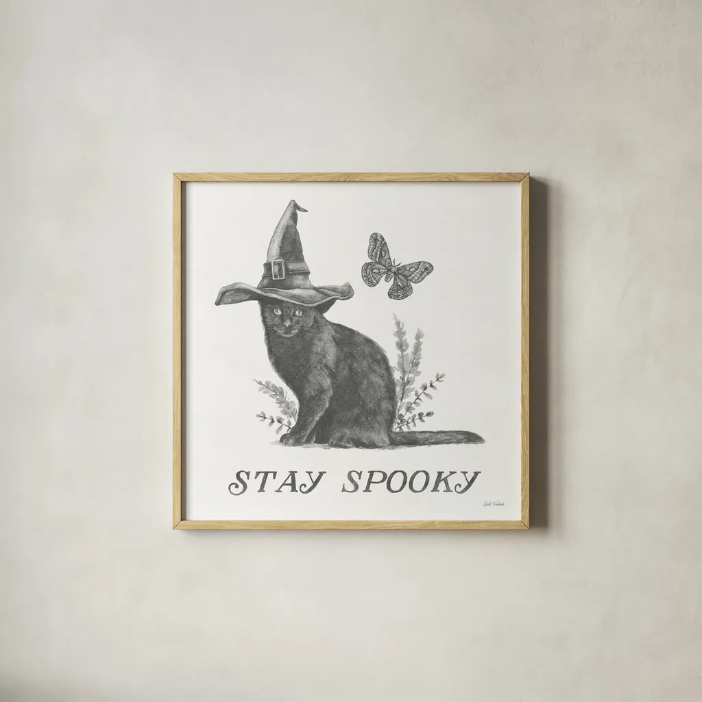 Spooky Halloween III by Leslie Trimbach. Shown in a natural wood glass frame for a timeless modern aesthetic. Available as an archival giclee rolled canvas, fine art paper, or poster print. SKU 93070a.