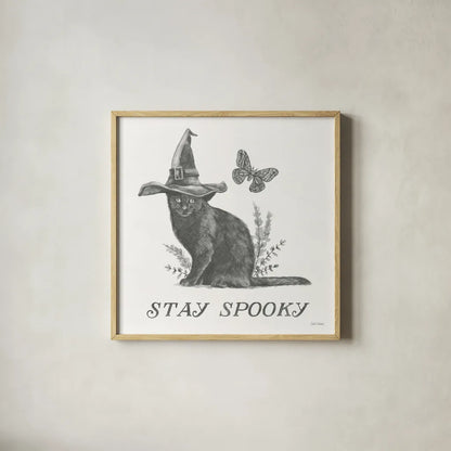 Spooky Halloween III by Leslie Trimbach. Shown in a natural wood glass frame for a timeless modern aesthetic. Available as an archival giclee rolled canvas, fine art paper, or poster print. SKU 93070a.