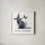 Spooky Halloween III Color by Leslie Trimbach. Shown in a crisp white glass frame for a clean and minimalist style. Available as an archival giclee rolled canvas, fine art paper, or poster print. SKU 93071a.