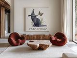Spooky Halloween III Color by Leslie Trimbach. Shown as extra-large giant wall art in a modern living room. Available as an archival giclee rolled canvas, fine art paper, or poster print. SKU 93071a.