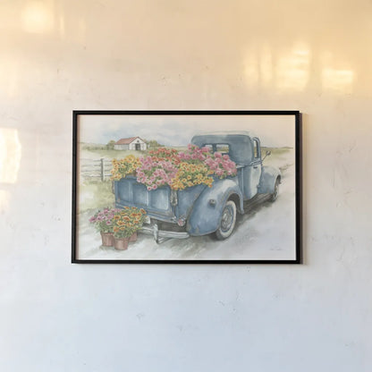 Truck with Flowers on Blue by Leslie Trimbach. shown as a paper print in a black flame. Available as a archival giclee rolled canvas, fine art paper, or poster print. SKU 86547i.