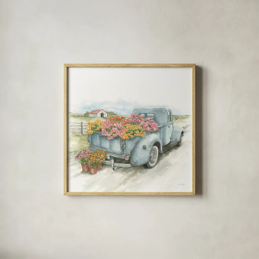 Truck with Flowers on Blue Sq by Leslie Trimbach. Shown in a natural wood glass frame for a timeless modern aesthetic. Available as an archival giclee rolled canvas, fine art paper, or poster print. SKU 86877a.