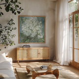 Twilight Hydrangea by Leslie Trimbach. Shown in a natural wood frame in a cozy modern living room. Available as an archival giclee rolled canvas, fine art paper, or poster print. SKU 91169a.
