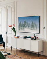 Winter Trees by Leslie Trimbach. shown as a framed stretched canvas in a living room above a console. Available as a archival giclee rolled canvas, fine art paper, or poster print. SKU 88918i.
