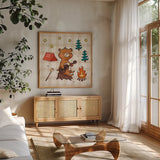 Camping Bears II by Lindley Wiesner. Shown in a natural wood frame in a cozy modern living room. Available as an archival giclee rolled canvas, fine art paper, or poster print. SKU 98370a.