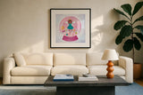 Sugar Plum Snowglobe by Lindley Wiesner. Displayed in a glass frame with matte in a clean modern living room. Available as an archival giclee rolled canvas, fine art paper, or poster print. SKU 95980a.