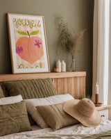 You're A Peach by Lindley Wiesner. shown as a paper print in a natural frame. Available as a archival giclee rolled canvas, fine art paper, or poster print. SKU 100039h.