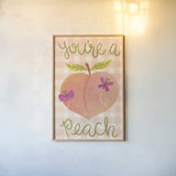 You're A Peach by Lindley Wiesner. shown as a paper print in a natural frame. Available as a archival giclee rolled canvas, fine art paper, or poster print. SKU 100039h.