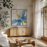 Blue and Green Garden VI by Lisa Audit. Shown in a natural wood frame in a cozy modern living room. Available as an archival giclee rolled canvas, fine art paper, or poster print. SKU 34789a.