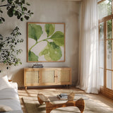 Blue and Green Garden VII by Lisa Audit. Shown in a natural wood frame in a cozy modern living room. Available as an archival giclee rolled canvas, fine art paper, or poster print. SKU 34785a.