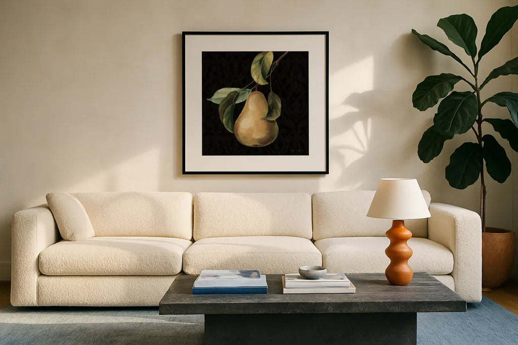 Fruit du Marche Pear on Black by Lisa Audit. Displayed in a glass frame with matte in a clean modern living room. Available as an archival giclee rolled canvas, fine art paper, or poster print. SKU 90893a.