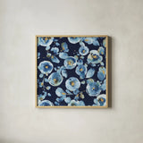 Indigold Flower Toss Indigo by Lisa Audit. Shown in a natural wood glass frame for a timeless modern aesthetic. Available as an archival giclee rolled canvas, fine art paper, or poster print. SKU 33664a.