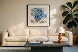 Indigold V by Lisa Audit. Displayed in a glass frame with matte in a clean modern living room. Available as an archival giclee rolled canvas, fine art paper, or poster print. SKU 24200a.