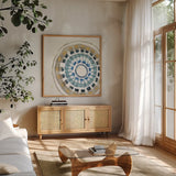 Indigold XIV by Lisa Audit. Shown in a natural wood frame in a cozy modern living room. Available as an archival giclee rolled canvas, fine art paper, or poster print. SKU 24209a.