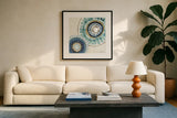 Indigold XV by Lisa Audit. Displayed in a glass frame with matte in a clean modern living room. Available as an archival giclee rolled canvas, fine art paper, or poster print. SKU 24210a.