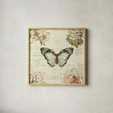 Marche de Fleurs Butterfly II by Lisa Audit. Shown in a natural wood glass frame for a timeless modern aesthetic. Available as an archival giclee rolled canvas, fine art paper, or poster print. SKU 10093a.