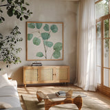 Mixed Greens LII by Lisa Audit. Shown in a natural wood frame in a cozy modern living room. Available as an archival giclee rolled canvas, fine art paper, or poster print. SKU 36528a.