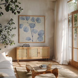 Mixed Greens LII Blue by Lisa Audit. Shown in a natural wood frame in a cozy modern living room. Available as an archival giclee rolled canvas, fine art paper, or poster print. SKU 42753a.