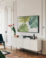Mixed Greens LXIX by Lisa Audit. shown as a framed stretched canvas in a living room above a console. Available as a archival giclee rolled canvas, fine art paper, or poster print. SKU 36544i.