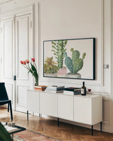 Mixed Greens XXXIII by Lisa Audit. shown as a framed stretched canvas in a living room above a console. Available as a archival giclee rolled canvas, fine art paper, or poster print. SKU 36491i.