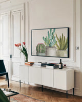 Mixed Greens XXXIV by Lisa Audit. shown as a framed stretched canvas in a living room above a console. Available as a archival giclee rolled canvas, fine art paper, or poster print. SKU 36492i.