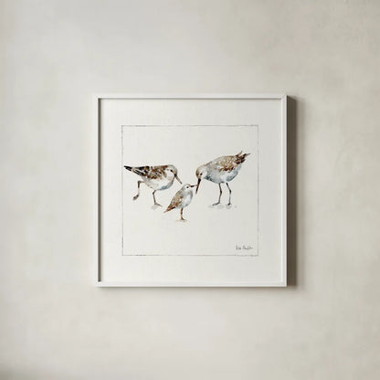 Pebbles And Sandpipers III v2 by Lisa Audit. Shown in a crisp white glass frame for a clean and minimalist style. Available as an archival giclee rolled canvas, fine art paper, or poster print. SKU 104091a.