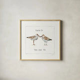 Pebbles and Sandpipers II by Lisa Audit. Shown in a natural wood glass frame for a timeless modern aesthetic. Available as an archival giclee rolled canvas, fine art paper, or poster print. SKU 17344a.