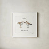 Pebbles and Sandpipers II by Lisa Audit. Shown in a crisp white glass frame for a clean and minimalist style. Available as an archival giclee rolled canvas, fine art paper, or poster print. SKU 17344a.