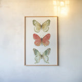 Rainbow Seeds Butterflies Fall I by Lisa Audit. shown as a paper print in a natural frame. Available as a archival giclee rolled canvas, fine art paper, or poster print. SKU 102339h.