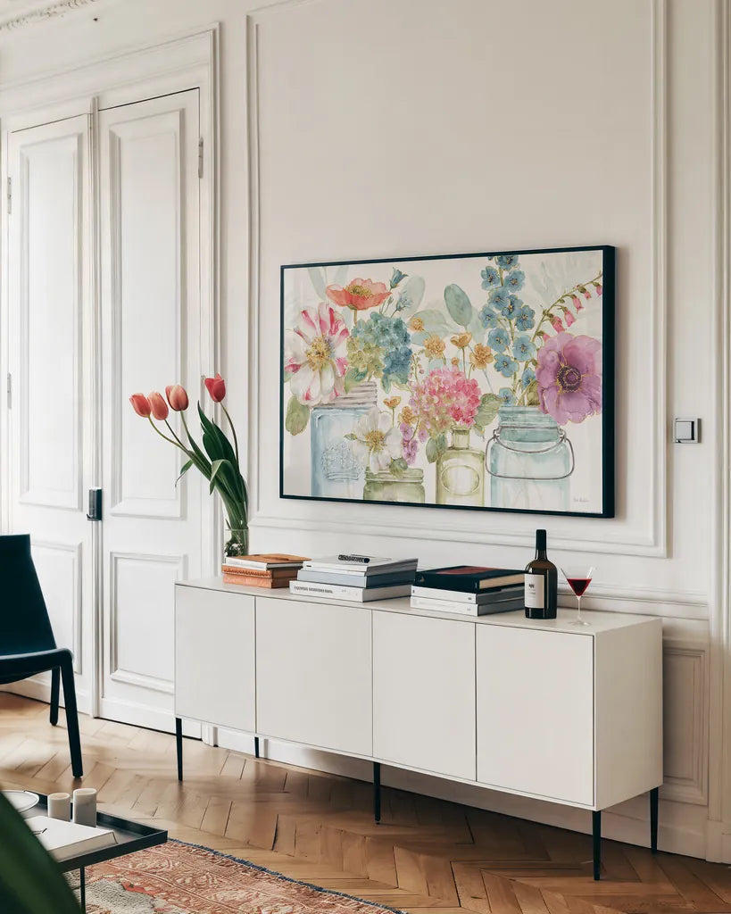 Rainbow Seeds Flowers X by Lisa Audit. shown as a framed stretched canvas in a living room above a console. Available as a archival giclee rolled canvas, fine art paper, or poster print. SKU 28860i.