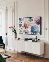 Spring Nectar I by Lisa Audit. shown as a framed stretched canvas in a living room above a console. Available as a archival giclee rolled canvas, fine art paper, or poster print. SKU 9314i.